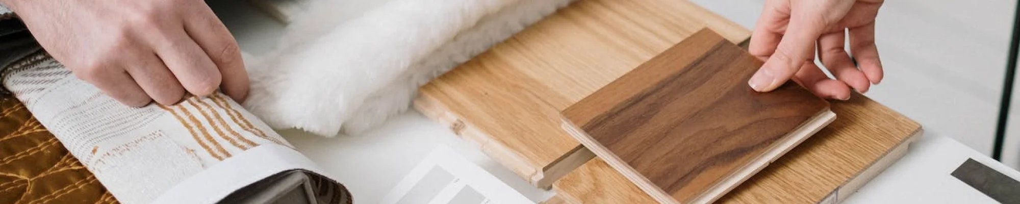 Browsing flooring and interior design samples for a Solana Beach home