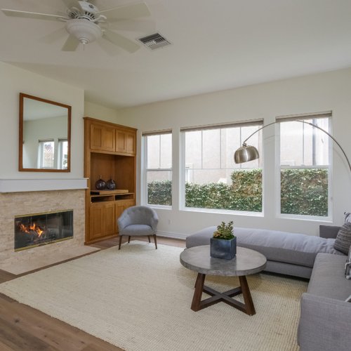 Living room with rustic hardwood flooring