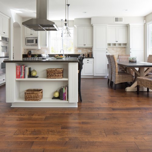 Large kitchen with new hardwood flooring by Solana Flooring