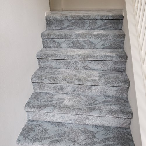 Grey carpeted stairs in California