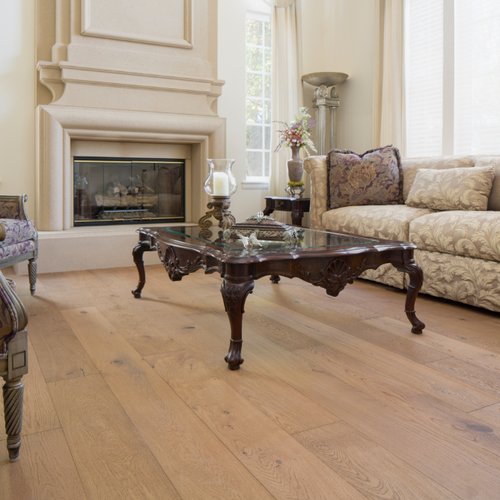 Vintage decor in a living room with light wood flooring