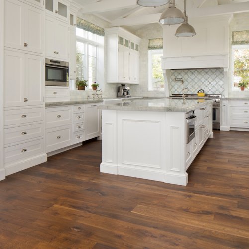 Wood floors in a bright and trendy kitchen