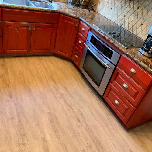 Traditional kitchen with luxury vinyl plank flooring