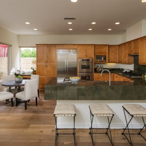 Kitchen with wide plank hardwood flooring