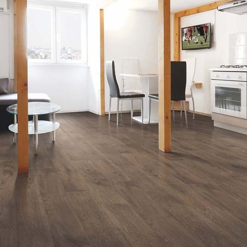 Dark brown laminate floors in a compact apartment in Solana Beach CA